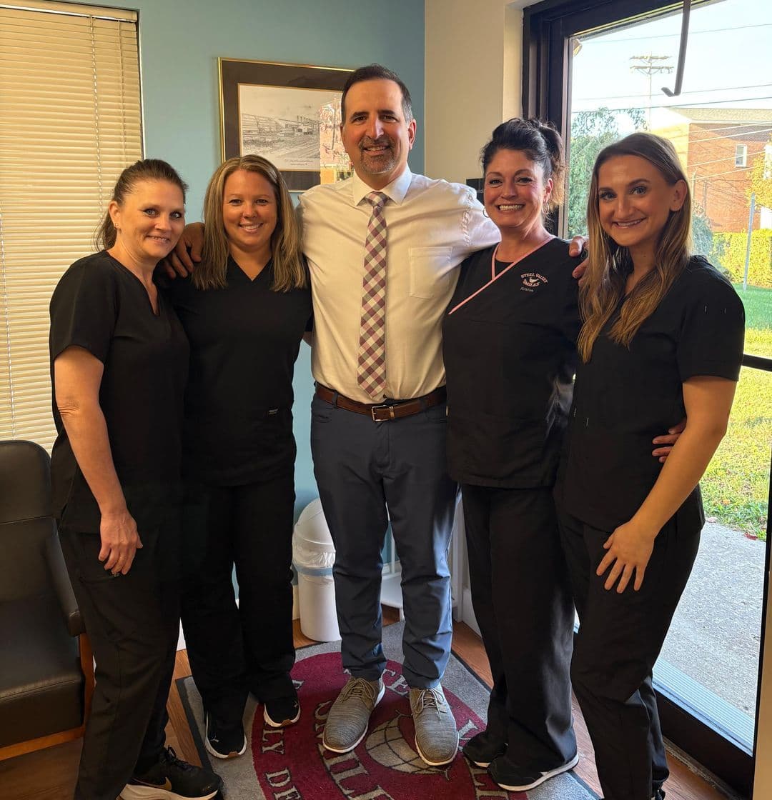 Steel Valley Smiles team outside the practice on Main Street in Munhall